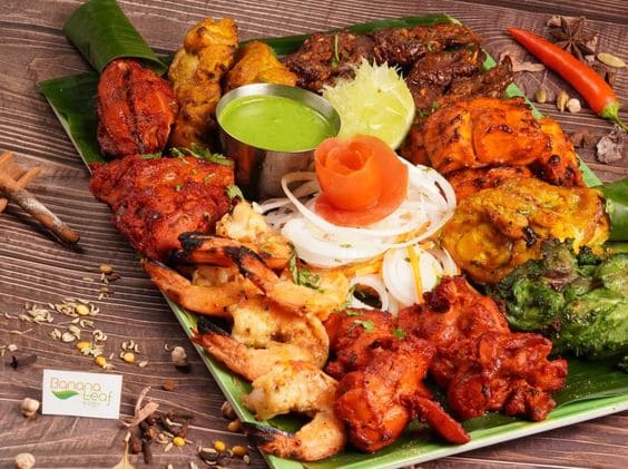 Image contains the picture of Sizzling Tandoori Platter.